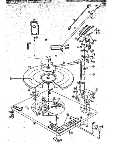 Parts above baseplate of changer
