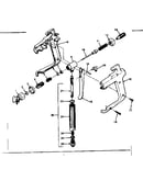 Spray gun and valve housing